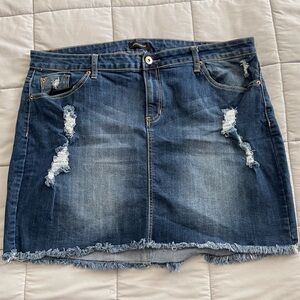 Destructed denim mini skirt